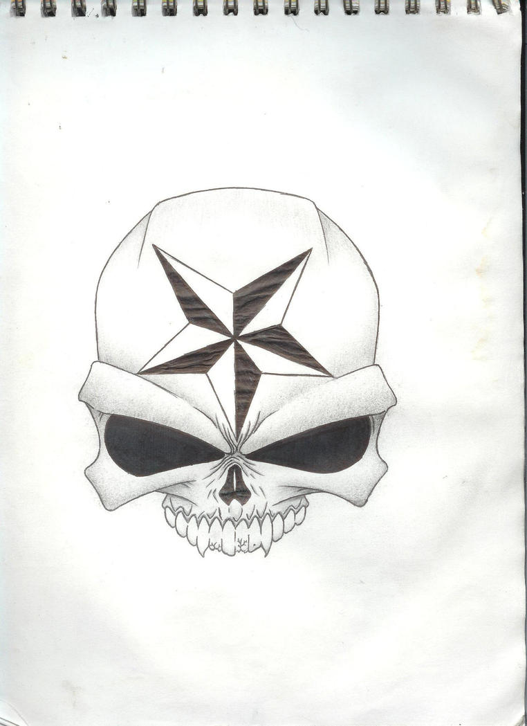 Skull and nautical star tattoo