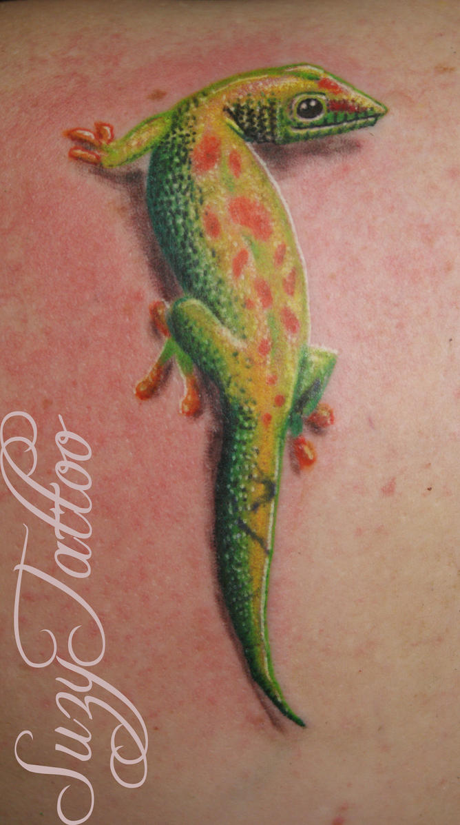 Green gecko back tattoo by